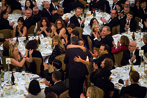 Formerly imprisoned Ethiopian journalist Reeyot Alemu embraces Mohamed Fahmy, Al-Jazeera journalist formerly imprisoned in Egypt, at CPJ's 2015 International Press Freedom Awards. (Getty Images/Michael Nagle)