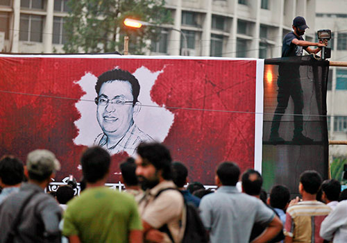 Um mural para Avijit Roy, em Dhaka, um dos quatro blogueiros assassinados por extremistas em Bangladesh este ano. (AP / A.M. Ahad)