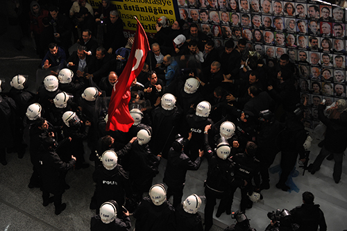 Riot police swarm the Istanbul offices of Turkish papers Zaman and Today's Zaman in March, after a court ruled that new trustees should take over the publications. (AFP/Akif Talha Sertturk, Zaman Daily Newspaper)