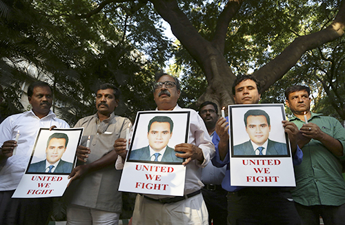 A vigil for Akshay Singh. His channel joined initial calls for an independent investigation into his death. (AP/Aijaz Rahi)