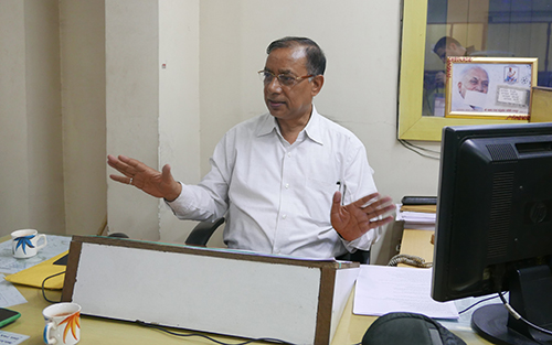 Umesh Rajput’s news editor Ghanshyam Gupta, pictured at the Nai Dunia offices, says the journalist was always objective in his reporting. (CPJ/Sumit Galhotra)