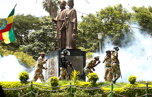 Police fire tear gas during a festival in Ethiopia's Oromia region. After months of protests, authorities have imposed a state of emergency that includes blocking access to social media. (Reuters/Tiksa Negeri)