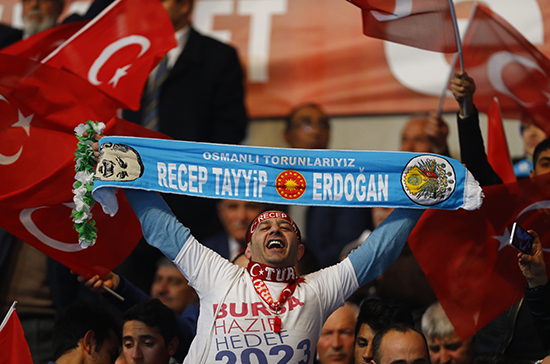 A ruling-party supporter cheers at a February 25, 2017, rally in support of constitutional amendments to give the president more power. (Reuters/Umit Bektas)