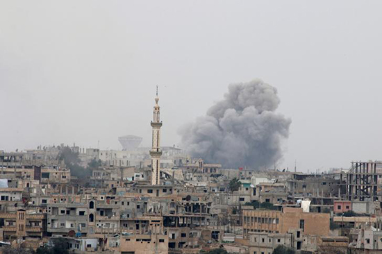 Smoke rises over the southwestern Syrian city of Daraa, March 10, 2017. (Reuters/Alaa Faqir)