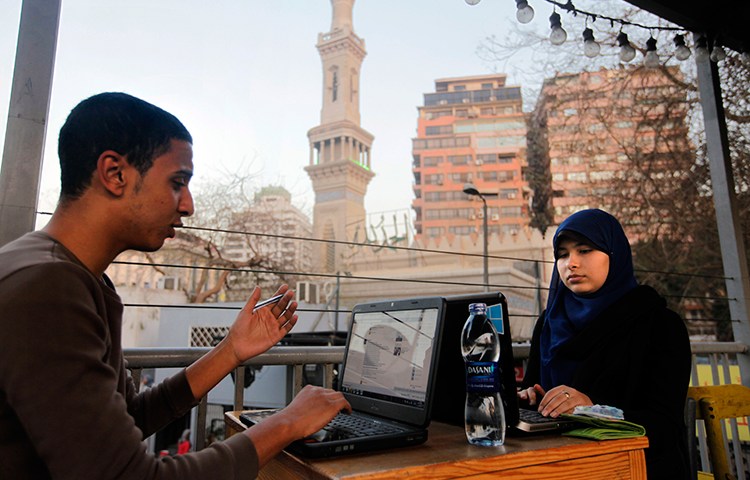 In this file photo, Egyptians access the internet at a community center in Cairo, February 9, 2013. (AP/Amr Nabil)