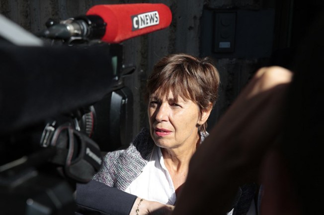 Mathias Depardon's mother, Daniele Van de Lanotte, speaks to reporters outside Turkey's Embassy to France, May 25, 2017. (AFP/Geoffroy Van Der Hasselt)