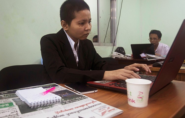 Journalists work in The Voice's office in Yangon, Myanmar, June 5, 2017. (AP/Thein Zaw)