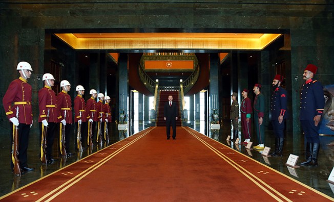 Turkish President Recep Tayyip Erdoğan stands in the presidential palace in Ankara, June 15, 2017. (AP/Presidency Press Service)