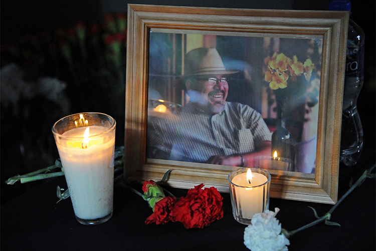 A portrait of Javier Valdez at a Mexico City event to pay tribute to the investigative journalist, who was murdered in May. (AFP/Bernardo Montoya)