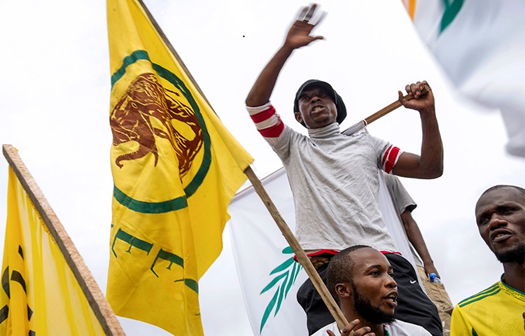 Protesters call for elections to be held at a rally in April 2016. Congolese authorities imprisoned a journalist who covered more recent demonstrations in Lubumbashi demanding that the president call elections. (AFP/Junior Kannah)