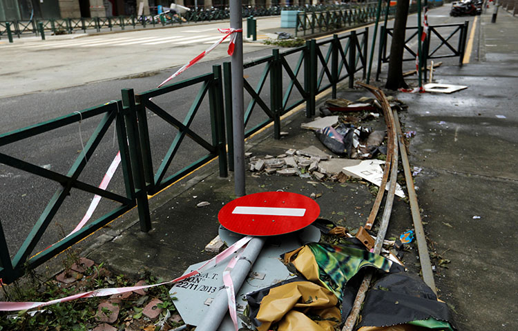 A fallen sign is seen as tropical storm Pakhar hits Macau, China on August 27, 2017. Macau authorities refused entry to the territory to four journalists from Hong Kong who planned to report on rescue and repair efforts after the storm. (REUTERS/Tyrone Siu)