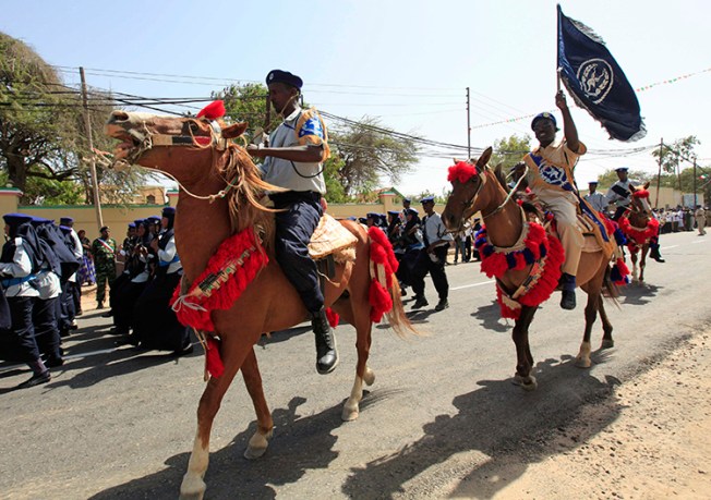 Somaliland police ride horses during independence celebrations in Hargeisa in 2013. Authorities in the region are detaining a journalist on false news accusations. (Reuters/Feisal Omar)