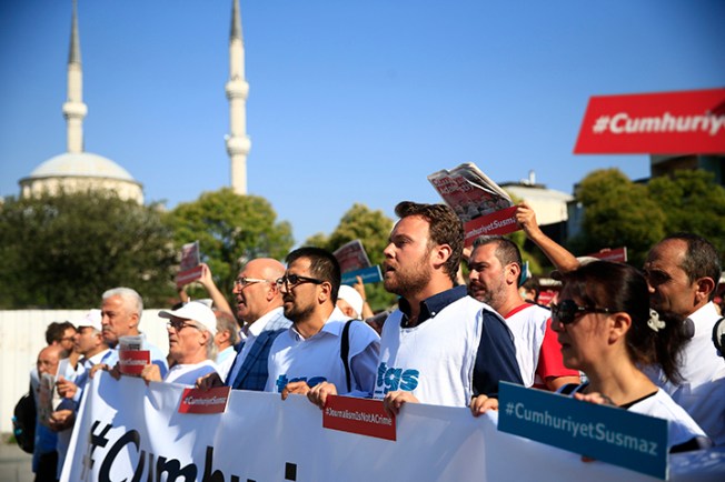 Activists march to a court in Istanbul on July 24, 2017, in protest against the trial of journalists and staff from the Cumhuriyet newspaper. According to CPJ research, Turkey is one of worst jailer of journalists. (AP/Lefteris Pitarakis)