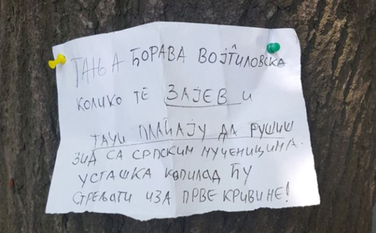 A death threat, pictured, directed at Tatjana Vojtehovski and full of derogatory terms, was pinned to a tree in a place visible to the critical journalist. (Tatjana Vojtehovski)