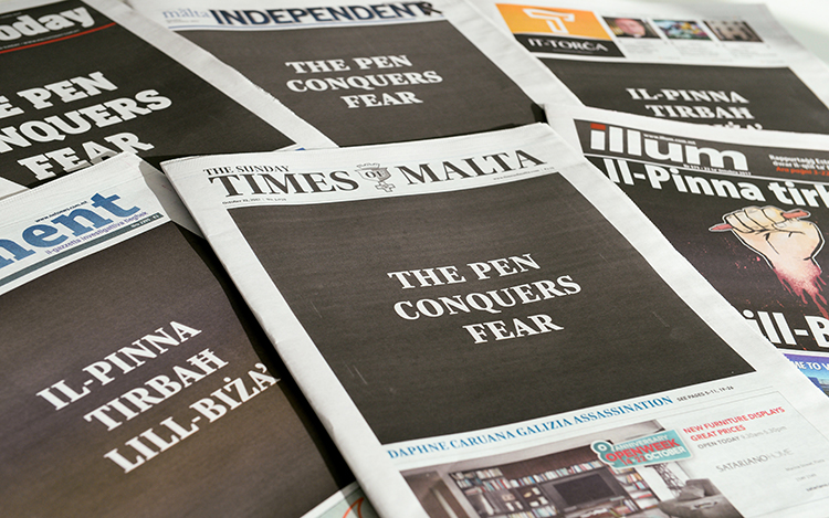 In a show of unity following the murder of Maltese blogger Daphne Caruana Galizia, the country’s newspapers carry the slogan ‘The Pen Conquers Fear’ on October 22. (AFP/Matthew Mirabelli)