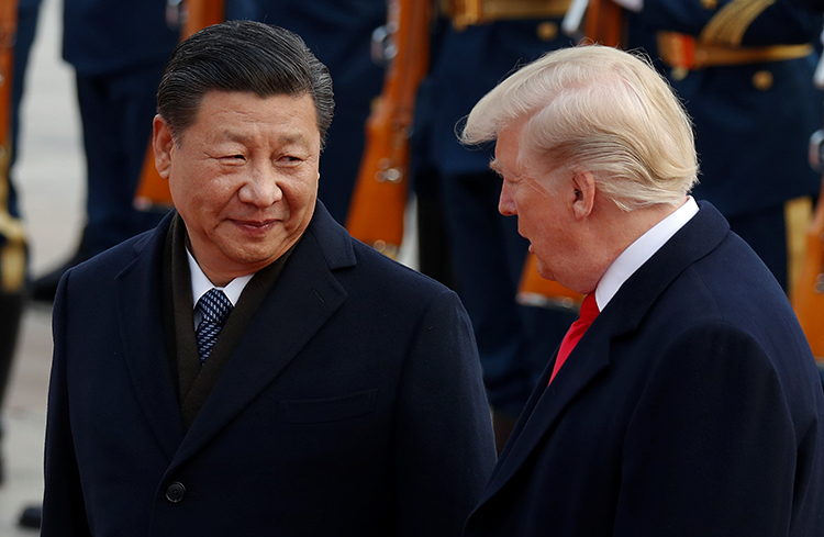 Presidents Xi Jinping and Donald Trump take part in a welcoming ceremony during a visit to Beijing in November 2017. China is jailing 41 journalists. (Reuters/Damir Sagolj)