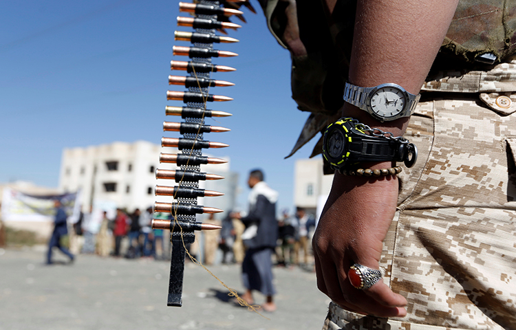 A Houthi militant takes part in a parade held to mark 1,000 days of the Saudi-led military intervention in the Yemeni conflict, in Sanaa, Yemen on December 19, 2017. (Reuters/Khaled Abdullah)