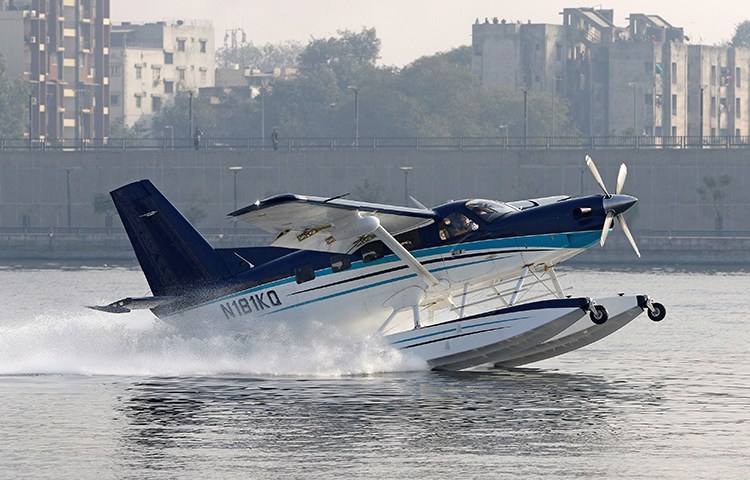 A sea-plane takes off in Ahmedabad in December. A journalist says Dalit activists in the city attacked and threatened her when she tried to interview a patient. (Reuters/ Amit Dave)