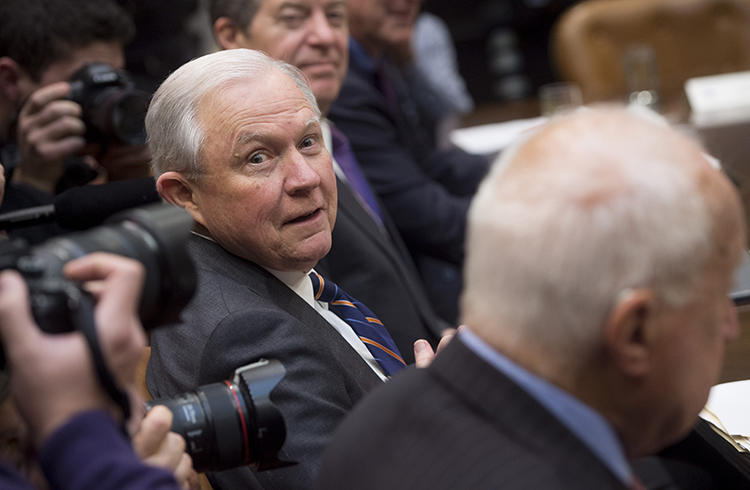 US Attorney General Jeff Sessions, pictured at a meeting in January 2018, has indicated he intends to pursue leak investigations. (AFP/Saul Loeb)