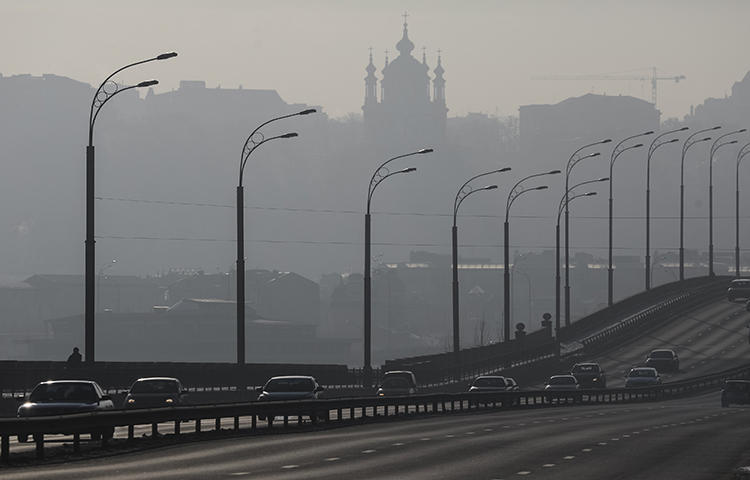 Cars drive on a highway on a sunny winter day in Kiev, Ukraine in January 2017. Igor Guzhva, editor-in-chief of the Kiev-based news website Strana, fled from Ukraine to Austria after receiving death threats, according to a statement published on the site.(Reuters/Gleb Garanich)