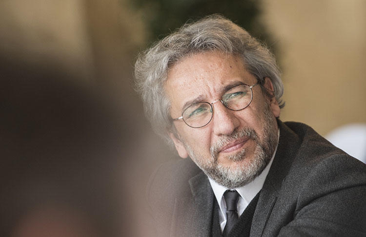 Turkey's Supreme Court has ruled that Cumhuriyet journalist Can Dündar, pictured in Postdam in 2017, should face a retrial on espionage charges. (AFP/Steffi Loos)