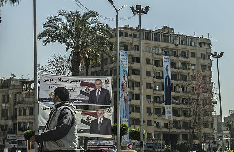 Presidential election campaign banners in downtown Cairo on March 7, 2018. At least four journalists have been detained since President Abdel Fattah el-Sisi declared his re-election bid. (AFP/Khaled Desouki)
