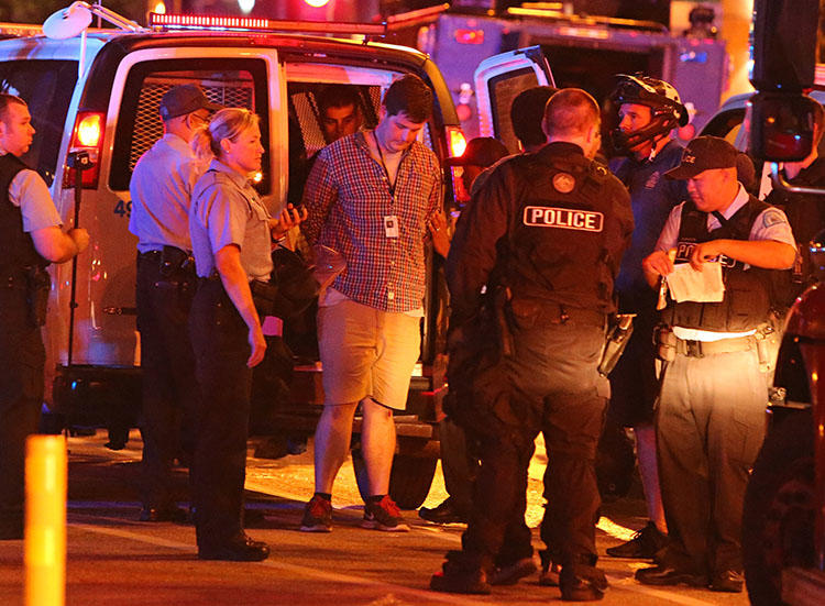 Police arrest St. Louis Post-Dispatch reporter Mike Faulk in September 2017. Faulk is one of at least 10 journalists detained in the city late last year when police used the tactic of kettling during protests. (David Carson/St. Louis Post-Dispatch)