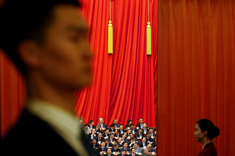 Delegates attend a plenary session of the Chinese People's Political Consultative Conference in Beijing in March 2018. Police in the city briefly detained a RFI reporter who was interviewing people about a vote on China's constitutional reform. (Reuters/Thomas Peter)