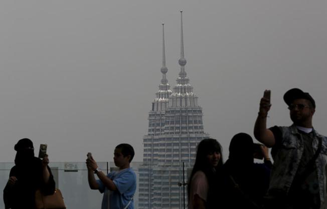 Malaysia's landmark Petronas Towers in Kuala Lumpur in March 2015. A Malaysian court on April 30, 2018, handed down the nation's first conviction under its recently enacted