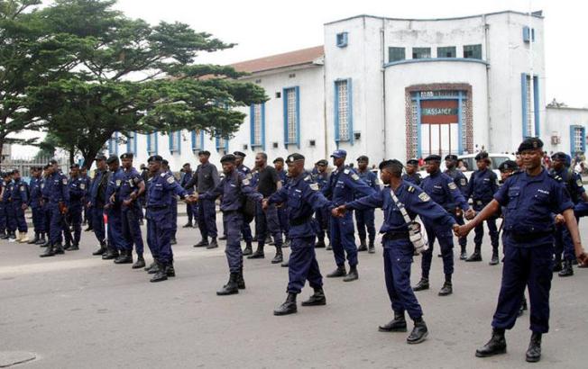 Riot police prepare ahead of civilian protests in Kinshasa. Journalists covering unrest in the DRC risk being detained, attacked, or harassed. (Reuters/Kenny Katombe)