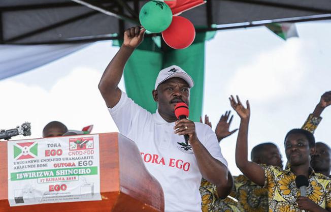 Burundi's President Pierre Nkurunziza speaks during the launch ceremony on May 2, 2018, for the a constitutional referendum scheduled for May 17 that would allow him to remain in power for another 16 years. Burundian authorities today suspended the licensing for BBC and VOA, according to reports. (AFP/STR)