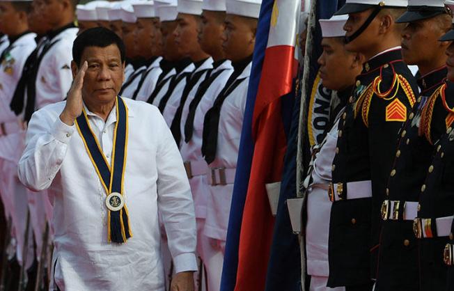 President Rodrigo Duterte, pictured in Manila in May 2018, says he wants all media killings solved by 2020. In the latest attack, a newspaper publisher was shot dead in Panabo City in June. (AFP/Ted Aljibe)