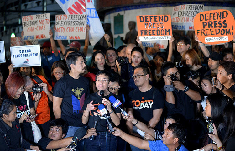 Rappler founder and CPJ's 2018 Gwen Ifill Press Freedom awardee Maria Ressa, pictured at a press freedom protest in January. Rappler is a prime target of the president's media intimidation tactics. (AFP/Ted Aljibe)