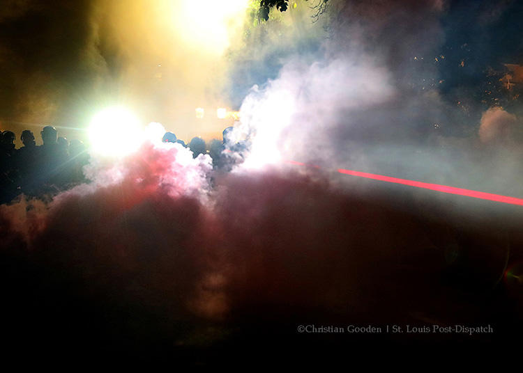 Police use laser-sighting while removing a large group of protesters in St. Louis on September 15, 2017. Journalist groups say news outlets and police need better training to ensure the press can cover protests safely. (Christian Gooden/St. Louis Post-Dispatch)