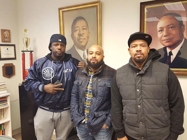 Zack Stoner, left, pictured with two members of Good Brothers, a community group he was part of. Stoner was shot dead in Chicago in May. (Charles Preston)