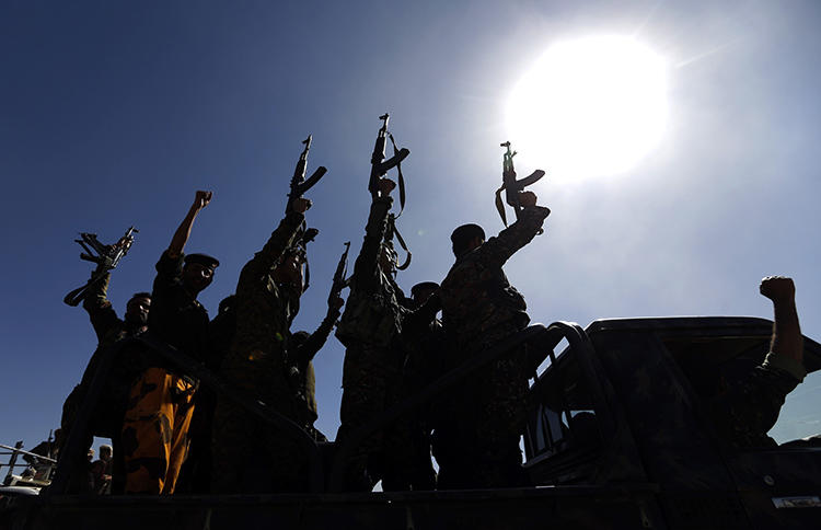 Houthis chant slogans in Sanaa in January 2017. A Yemeni journalist has been detained since July 22 after being stopped at a Houthi checkpoint in Rahda. (AFP/Mohammed Huwais)