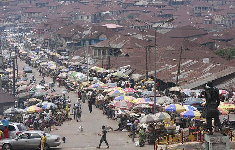 A market along the street in Ibadan, in Nigeria's southwestern Oyo state, on September 22, 2012. Fresh FM radio station in Ibadan was partially demolished on August 19, 2018. (AP Photo/Jon Gambrell)