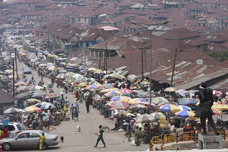 A market along the street in Ibadan, in Nigeria's southwestern Oyo state, on September 22, 2012. Fresh FM radio station in Ibadan was partially demolished on August 19, 2018. (AP Photo/Jon Gambrell)