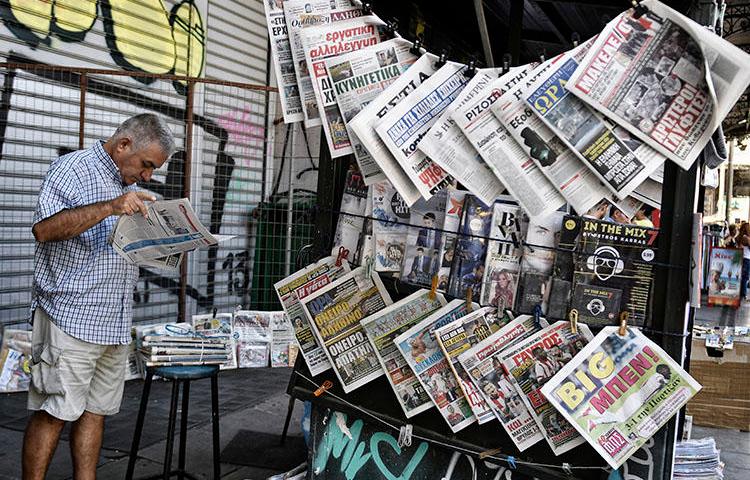 A newspaper stand in Athens, in July 2017. Police detained three journalists at the daily paper Fileleftheros, after a politician filed a defamation complaint. (AFP/Louisa Gouliamaki)