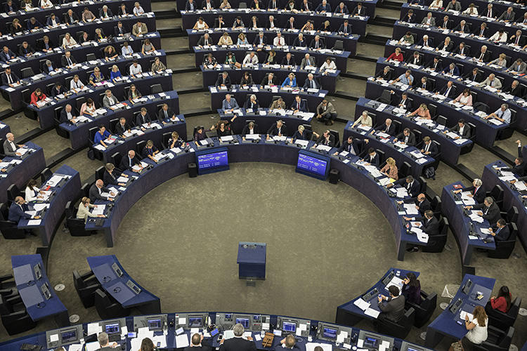 Members of the European Parliament take part in a vote in Strasbourg, France, on September 12, 2018. EU lawmakers voted in favor of a resolution to trigger Article 7 of the Treaty of the European Union against Hungary for breaching EU values. (AP Photo/Jean-Francois Badias)