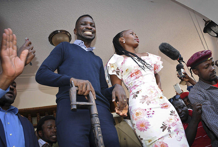 Opposition MP Kyagulanyi Ssentamu, known as Bobi Wine, and his wife Barbara Itungo Kyagulanyi, pictured at their home in Kampala, on September 20. Police detained at least eight journalists who were covering Bobi Wine's return to Uganda from the U.S. (AP/Ronald Kabuubi)