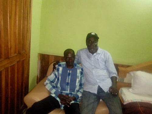 Nigerian journalist Jones Abiri, left, and a friend after the journalist's release from prison. (Alagoa Morris)