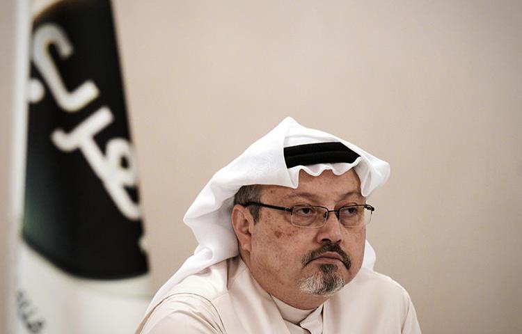 Saudi journalist Jamal Khashoggi at a press conference in the Bahraini capital Manama on December 15, 2014. Khashoggi was last seen entering the Saudi consulate in Istanbul, Turkey, on October 2, 2018. (AFP Photo/Mohammed al-Shaikh)