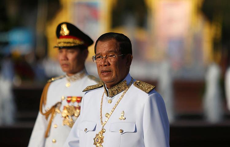 Cambodian Prime Minister Hun Sen attends celebrations marking the 65th anniversary of the country's independence from France, in Phnom Penh, Cambodia, on November 9, 2018. A Cambodian news fixer was deported from Thailand to Cambodia on a 'false news' accusation on December 12. (Reuters/Samrang Pring)