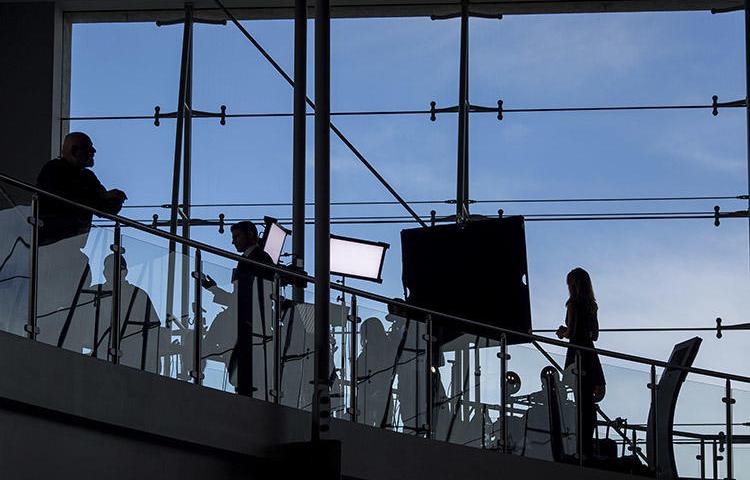 News crews set up inside in the Air Force One Pavilion in 2016 to report of the passing of former First Lady Nancy Reagan. Female journalists working for local broadcasters across the U.S. have spoken of the threats and unwanted attention they have to deal with. (Getty Images/AFP/David McNew)