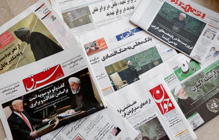 A picture taken on September 26, 2018, shows the front pages of Iranian newspapers at a newspaper stand in the capital Tehran. Iran jailed a journalist for six years over his critical writing on December 25, 2018. (AFP/Atta Kenare)