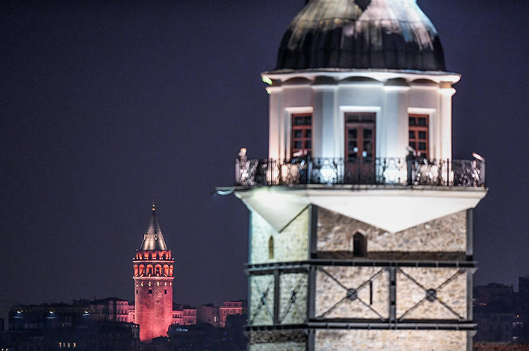 A view of Maiden's Tower, front, and Galata Tower, in Istanbul. A court in the city has sentenced Turkish journalist Ayşe Nazlı Ilıcak to an additional five years in prison. (AFP/Ozan Kose)