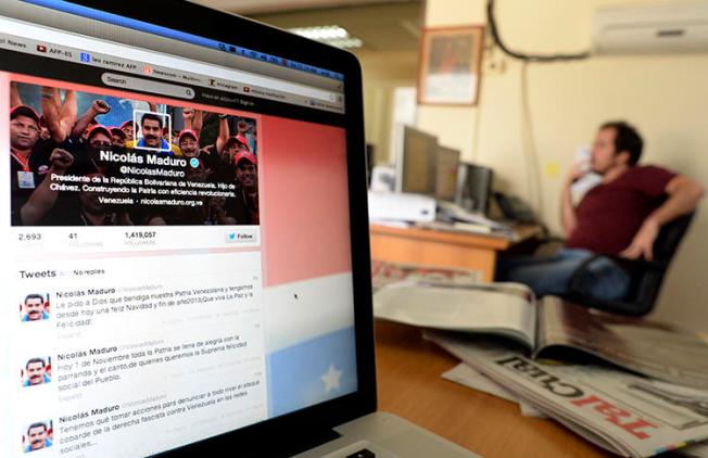 View of a computer screen showing the Twitter account of Venezuelan President Nicolas Maduro, in Caracas. A proposed law in Venezuela would expand the powers of the government to control and monitor internet use without institutional checks. (Juan Barreto/AFP)