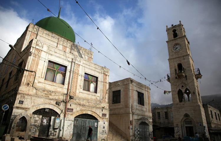 A street in the West Bank city of Nablus is seen on May 15, 2018. Two journalists were recently arrested in the West Bank; one has been released, but the other remains behind bars. (AFP/Jaafar Ashtiyeh)