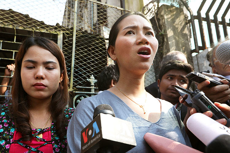 Pan Ei Mon, left, and Chit Su Win, wives of jailed Reuters reporters Wa Lone and Kyaw Soe Oo, talk to media after their appeal was rejected by a court in Yangon, Myanmar, on January 11, 2019. (Reuters/Ann Wang)